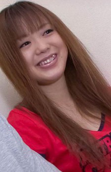 Noriko Kago Asian doll in red t-shirt takes care of phallus head