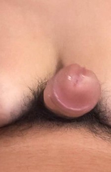 Meguru Kosaka Asian teases cock with tongue between her hooters