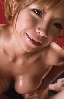 Sumire Matsu Asian rubs penis of and between her oiled boobies