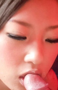 Satomi Suzuki Asian rubs hard cock between assets and licks it