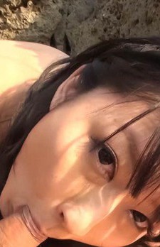 Megumi Haruka Asian sucks boner and rubs it with tits on sand