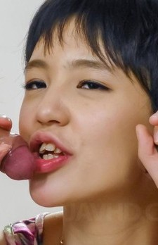 Sakura Aida Asian has cum on chin from licking and sucking dongs