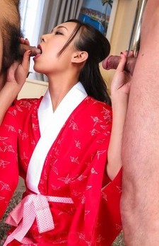 Saki Fujii Asian in kimono sucks and strokes two dicks for cum